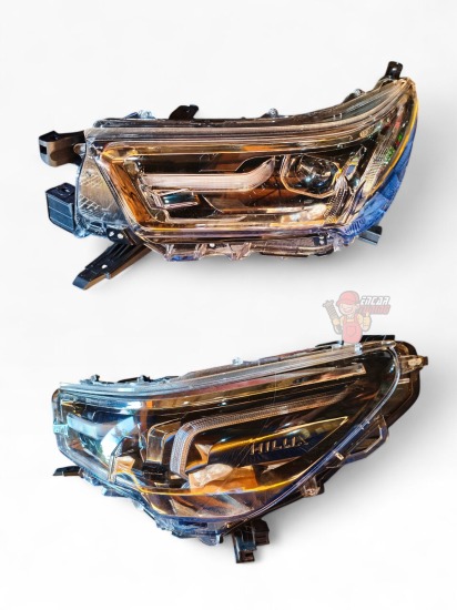FARO DELANTERO CROMADO HILUX UND 16+  LADO CONDUCTOR